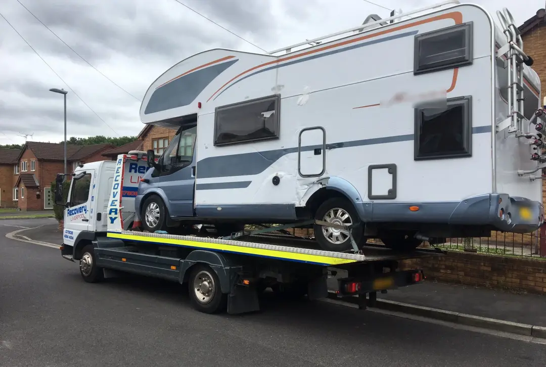 Heavier vehicle recovery: motorhome strapped onto our recovery truck